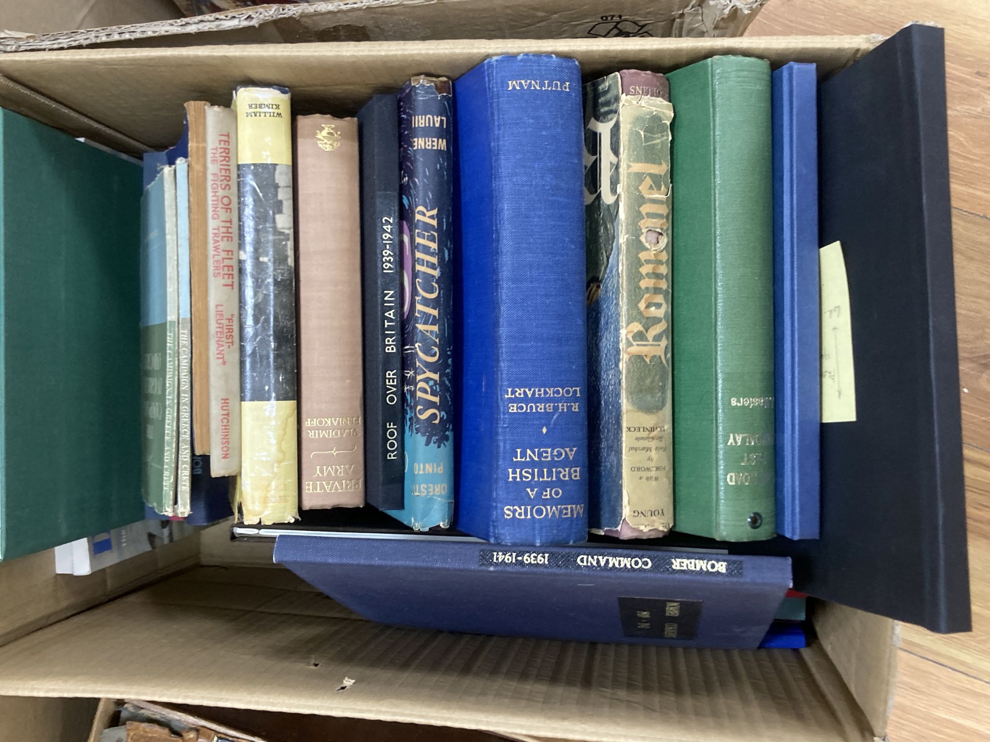 A collection of books, including bibles, childrens, Sussex-related, HMSO, etc.